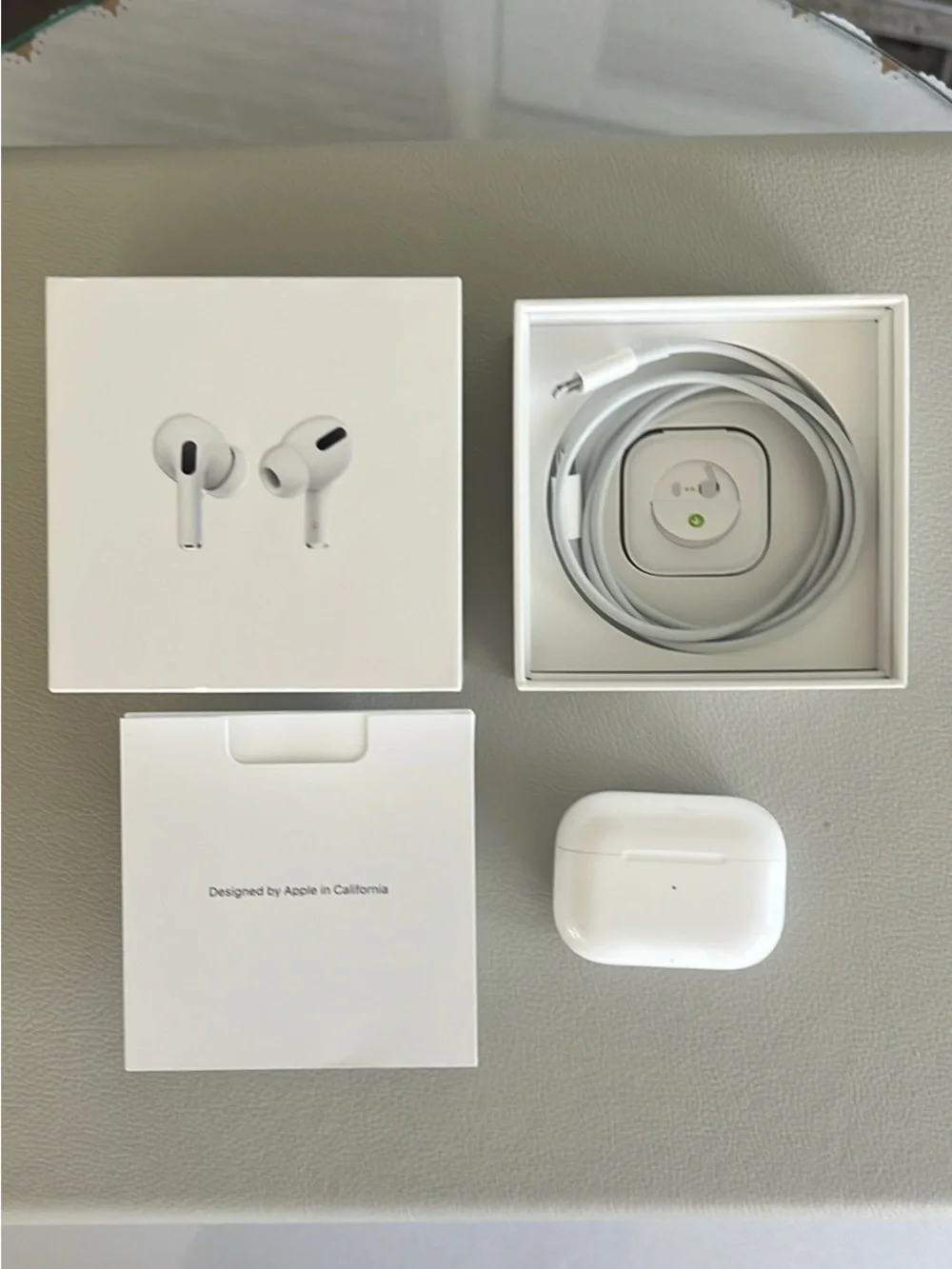 Apple AirPods Pro with charging cord